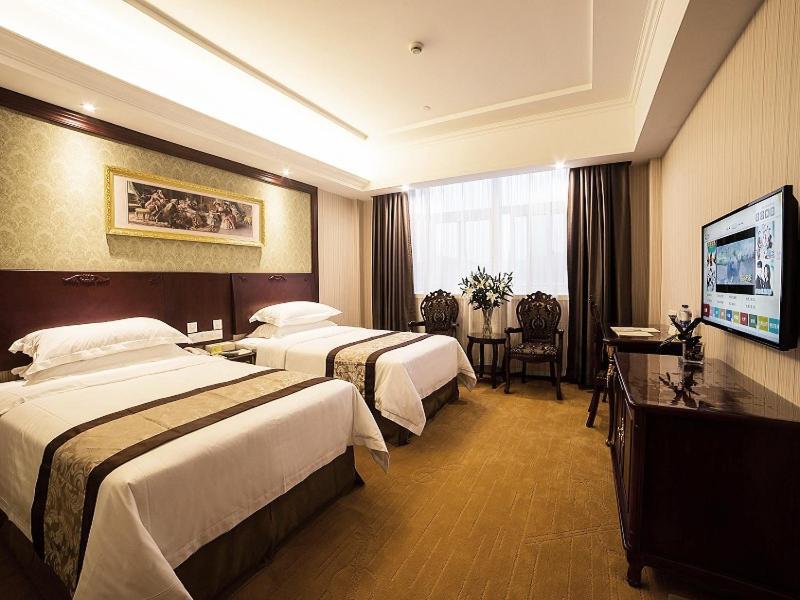 Vienna Hotel Shipu Yugang Xiangshan  Bagian luar foto